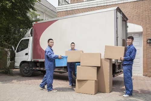 Man and van pricing explained with moving boxes and van load illustration