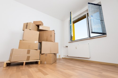 Team preparing desks and office equipment for a move