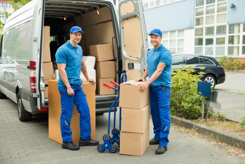 Professional movers loading a van for a local relocation