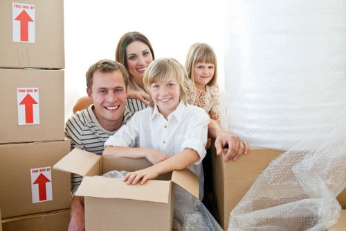 Professional mover using protective equipment during a house move